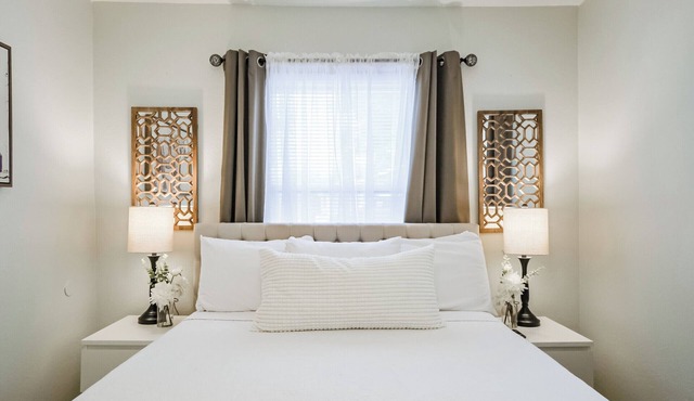 Enjoy two separate, fully furnished homes on one property — perfect for large groups. The front one-story home offers 3 bedrooms and 1 bath, while the back two-story home features 3 bedrooms, 2 baths, and an upstairs family room with 2 beds