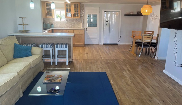 Enjoy views of beautiful Houghton Lake in charming LARGE home that sleeps 10.