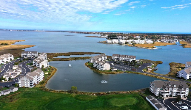 Enjoy your getaway in this lovely 2 bed/2 bath condo in the Bethany Bay Community! Excellent view! Pets Allowed! 9-Hole Golf! Seasonal Outdoor Pool! Beach Town!
