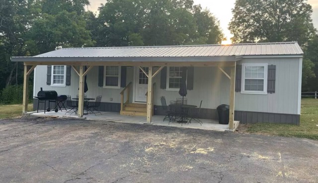 Enjoyable 2-bedroom house on 24 acres right on Black River.