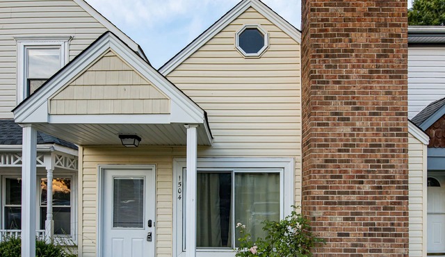 Enticing Den with Backyard and Indoor Fireplace