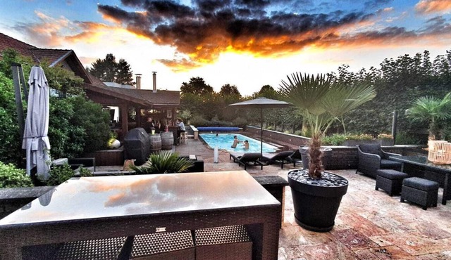 Entire floor in a fully renovated town house with swimming pool.