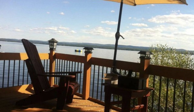 Entire four bedroom home with private beach and Lake Access