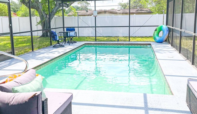 Entire home with Screened- In Pool , Fully Fenced.