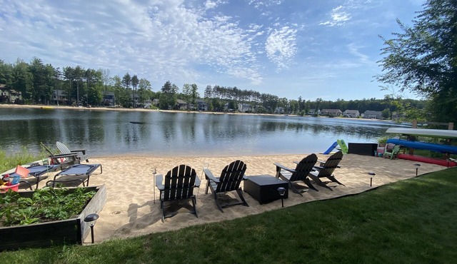 Entire house with beach on large swimming pond with hot tub