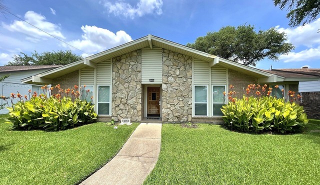 Entire house with private patio, fenced in yard and two car garage in quiet area