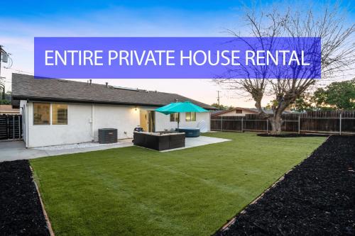 Entire Private Home with 4Bedrooms 2Bathrooms, Hot Tub, King Bed, Garage, Gated Backyard, Available Now