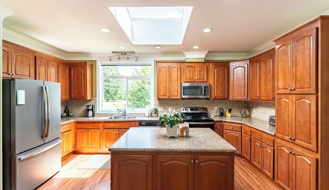 Entire three bedroom rambler. Sleeps 8 in four separate rooms. 5 private acres.