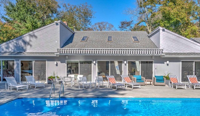 Escape and enjoy a peaceful vacation at this Southampton Estate with Pool.