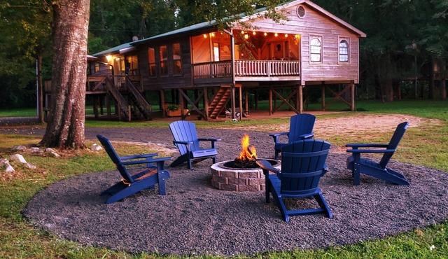 Escape City Life at this Exceptional Cabin Retreat with River Views.
