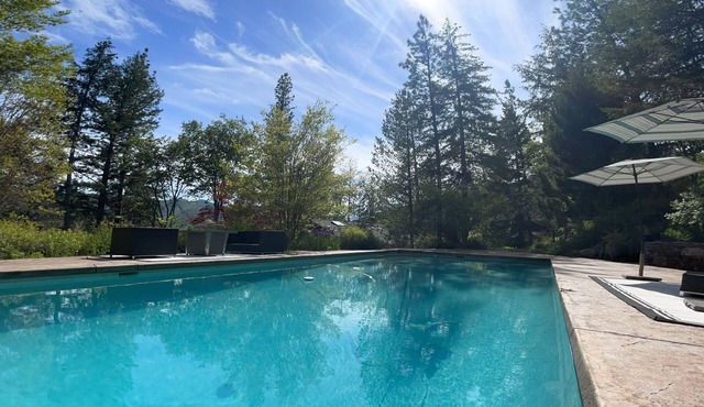 Escape to 150 Acres, 3BR Estate with Pool, Trails & Total Privacy