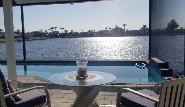 Escape to 80 ft Waterfront Luxury, Private Pier, Heated Pool, Jacuzzi, Bicycles!