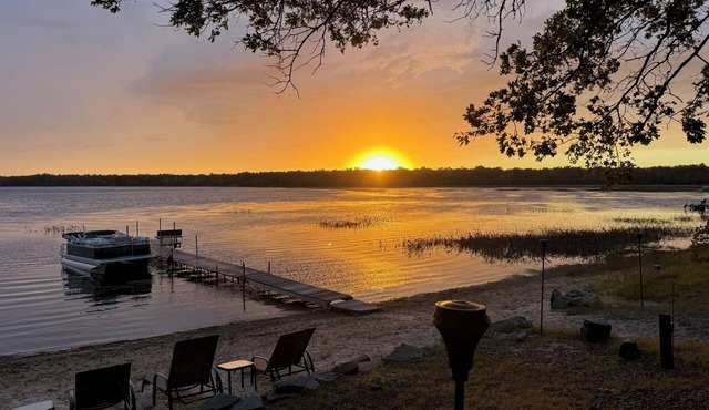Escape to a Beautiful 4-Bedroom 2-Bath Waterfront Log Home in Danbury, Wisconsin