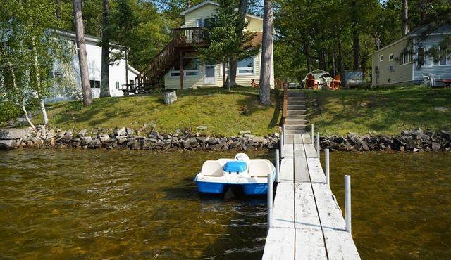 Escape to a cozy cottage on Ausable Lake, in Lupton, Michigan!