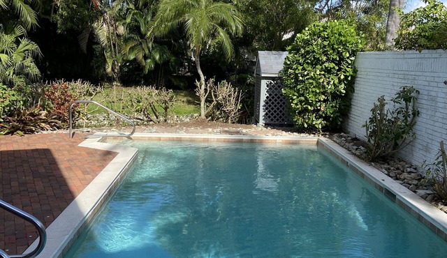 Escape to a Private Paradise Walking distance to Beach!
