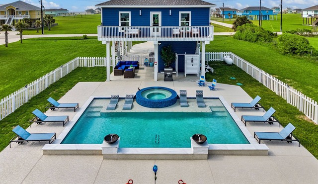 Escape to a Sunny Poolside Oasis & Expansive Deck