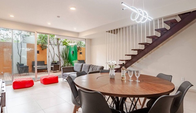 Escape to an exclusive duplex with wine and terrace