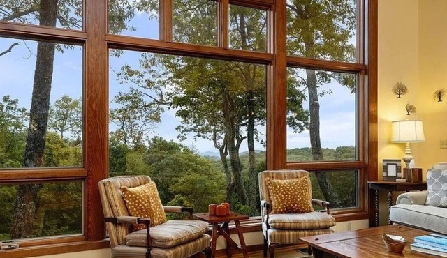 Escape to Breathtaking View Retreat at Wintergreen a stunning 3-bedroom, 4-bath mountain home with three incredible decks, cozy fireplace, grill and patio area, and breathtaking Blue Ridge views perfect for families and kids!