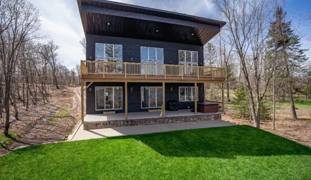 Escape to Chub Lake Retreat: Waterfront Luxury House in Carlton, Minnesota