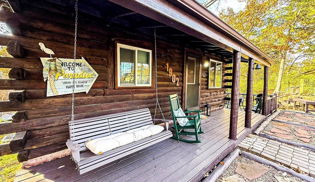 Escape to Grandpa John’s Cabin in Four Seasons near Shady Gators & Camden on the Lake. This restored 2 bed, 2 bath log cabin features a king suite, bunk room, fireplace, coffee bar, deck, firepit, pet-friendly stay, and parking for cars & small boat.