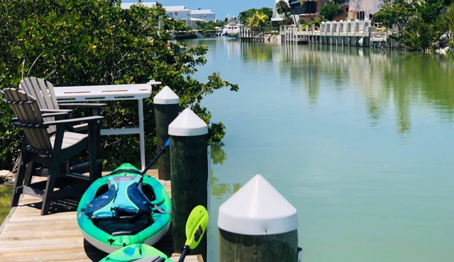 Escape To Marathon in Large 4BR 3BA Canal Front Home Sleep 10 with Heated Pool