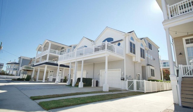 Escape to our stunning Beach Block Retreat, just steps from the sand and surf!