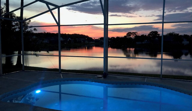 Escape to Paradise!Luxury Waterfront Heated Pool House with Game Room and Piano!