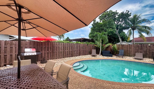 "Escape to paradise: Relax at Splendid Scapes with pool and game room"