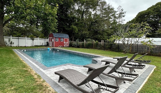 Escape to serene 3BR Cutchogue haven with heated pool, near beaches & vineyards.