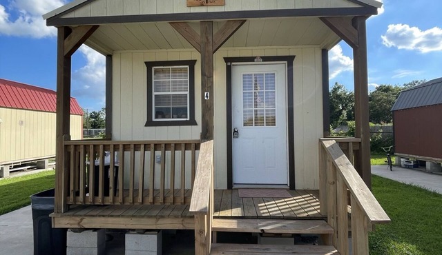 Escape to Serenity: Discover the Rustic Charm of the Wade Cabin at Tripl RV Park