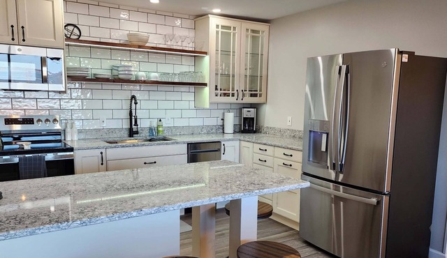 Escape to Spicer and enjoy stunning lake views from this comfortable 2-bedroom!