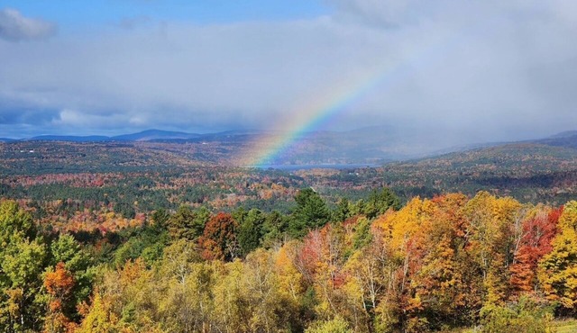 Escape to Sunset Slopes, where breathtaking mountain views and peaceful hillside surroundings