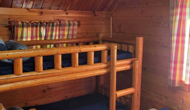 Escape to Texarkana's Log Cabin with All the Comforts!