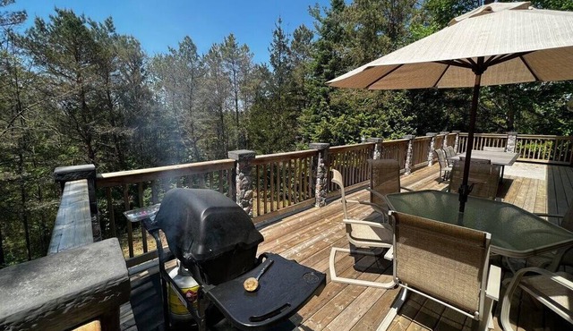Escape to the Forest: Beach Access, Jacuzzi, and Cozy Fireplace