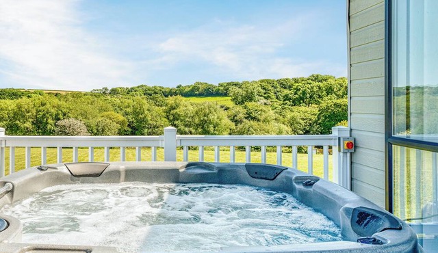 Escape to the Jasmine Lodge, nestled amidst stunning rolling countryside.