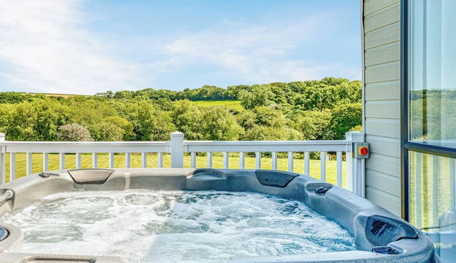 Escape to the Jasmine Lodge, nestled amidst stunning rolling countryside.