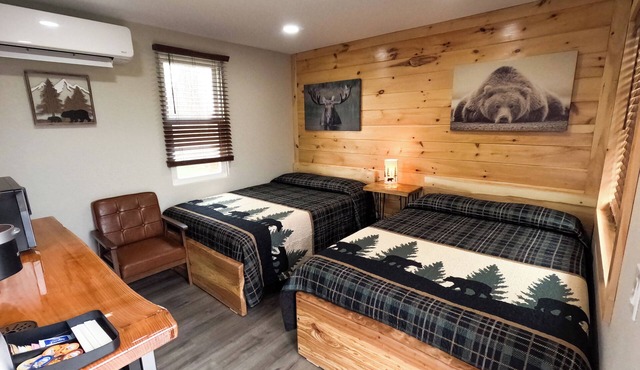 Escape to the tranquility of our cozy cabin inn, where rustic charm meets modern comfort. Experience a home away from home ambiance.