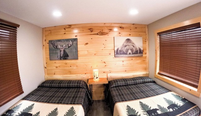 Escape to the tranquility of our cozy cabin inn, where rustic charm meets modern comfort. Experience a home away from home ambiance.