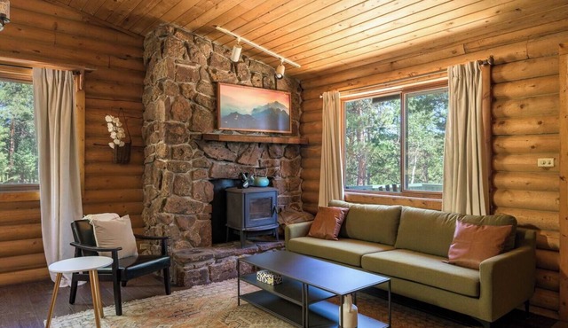 Escape to the tranquility of Bailey, Colorado. This spacious 3-bedroom, 2-bathroom