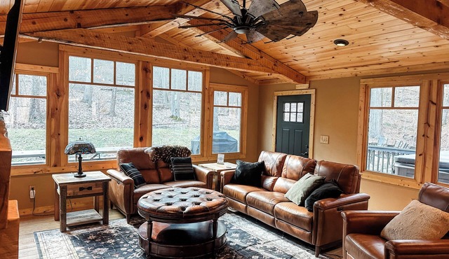 Escape to the wood—featuring hot tub, private trails, fire pit, peaceful seclusion. Dogs welcome.