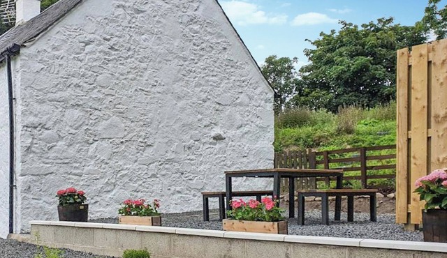 Escape to this charming Ayrshire cottage with breathtaking sea views.