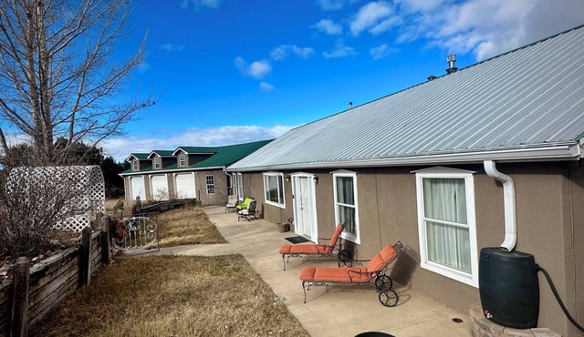 Escape to this “Country Manor” on almost 3 acres with incredible views.