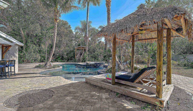 Escape to Villa Manteago: Resort-Style Estate with Pool, Spa, and Game Room, Minutes from Bradenton!