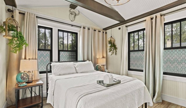 Escape to your private castle! This 2BR cottage comfortably fits 4, featuring a private pool, fenced yard, and modern-rustic charm. Perfect for families or couples, it's dog-friendly and just 2 miles from Downtown and 10 miles from Pensacola Beach.