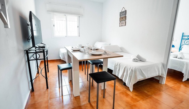 Escuela Village | Budget Quadruple Apartment