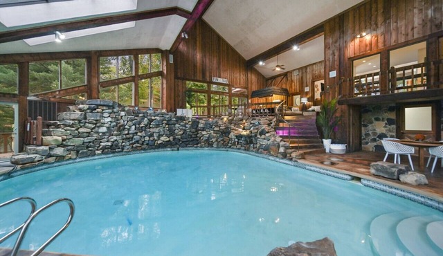 Events Welcome! Exclusive 65-Acre Gated Estate w/Indoor Pool & Private Lake