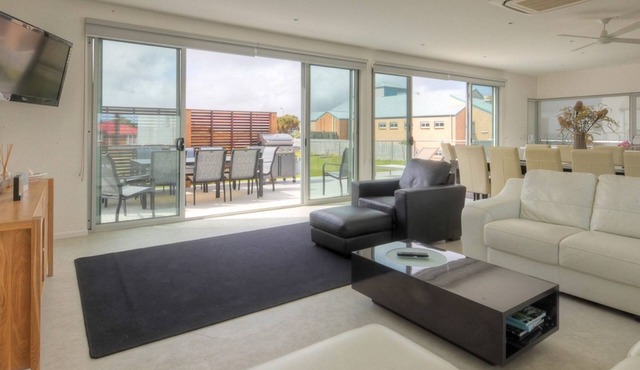 Excellent value for multiple families. Right behind the Surf Club.