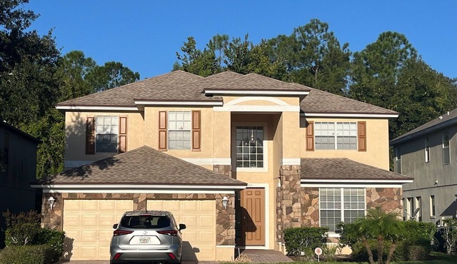 Exceptional 5 bedroom home, gated community, less than 30 mins from attractions.
