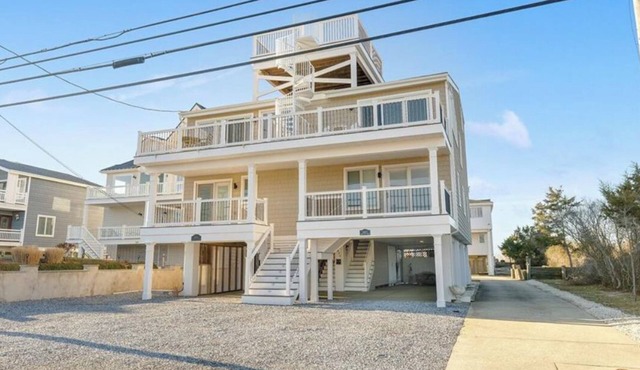 Exceptional Beach facing townhome with stunning Ocean and Bay views
