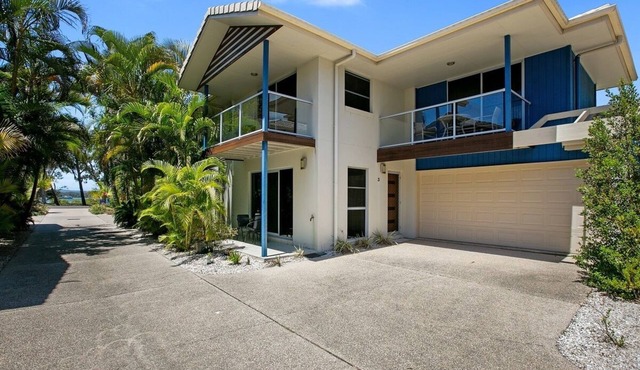 Exceptional modern three bedroom townhouse with water on both sides.